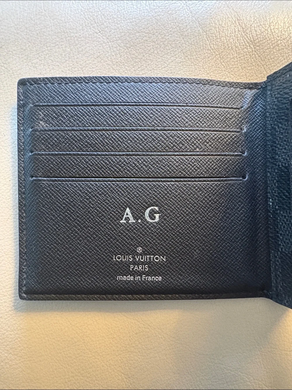 Louis Vuitton Men's Black Leather Bi-Fold Wallet
